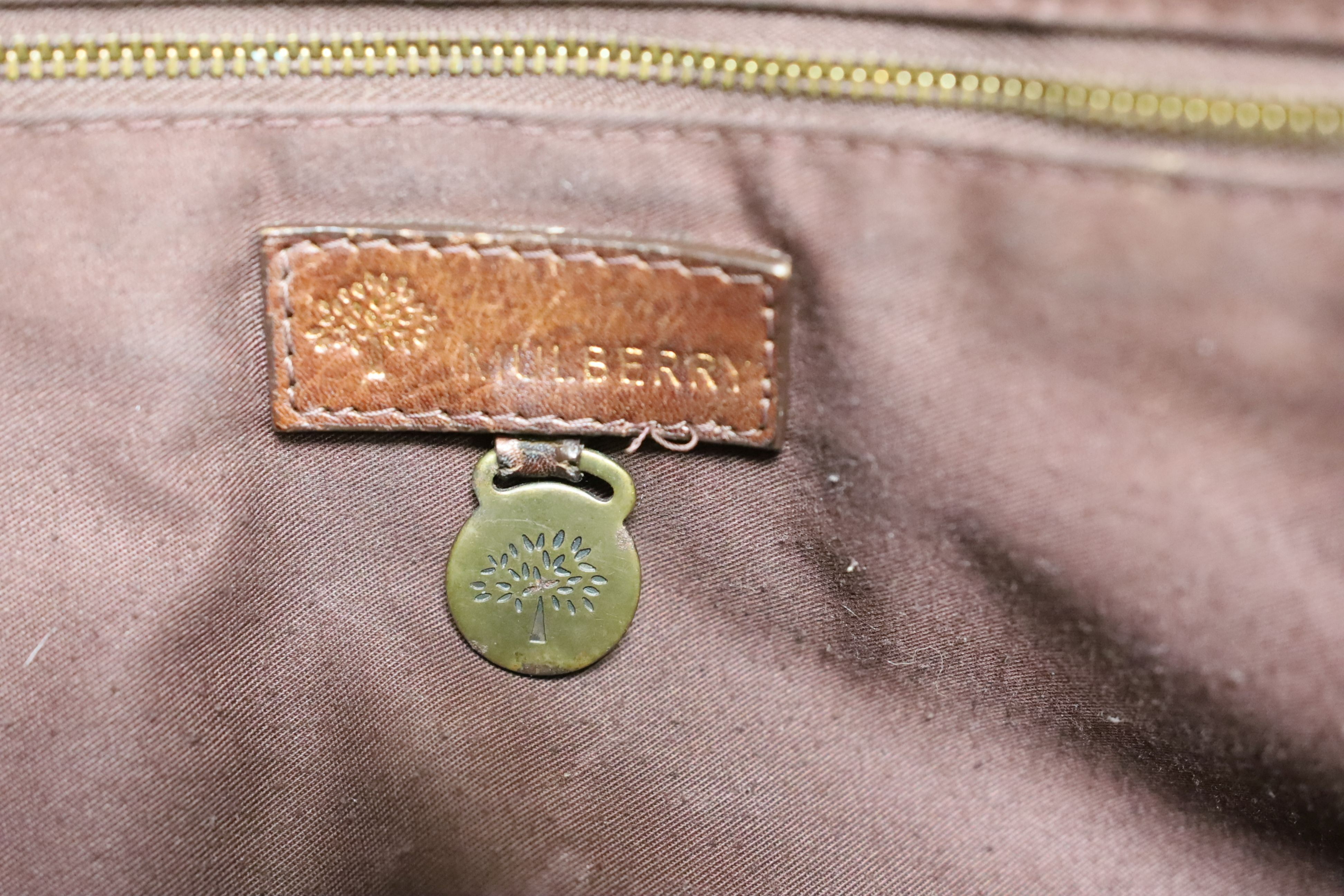 A vintage, Mulberry brown leather ‘shopper’, bag, with shoulder straps, 35 cms high x 52 cms wide.